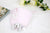 Babero doble tela lunares rosado con figura coneja